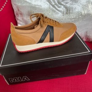 MIA kable lace up khaki sneakers, tan overall and red bottoms